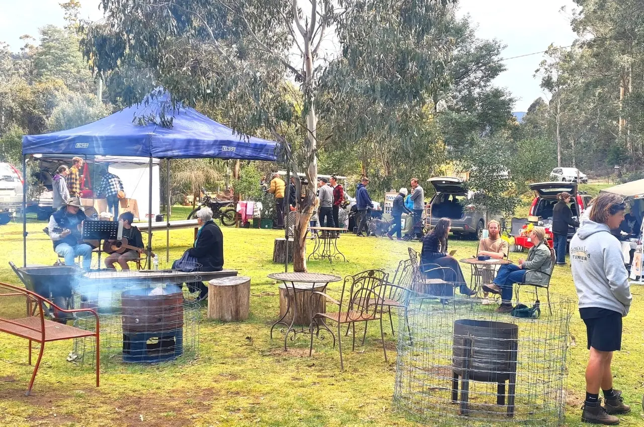 Fire pots adding atmosphere and warmth to a gathering at the Crabtree Crop & Crafts Market and Get-Together